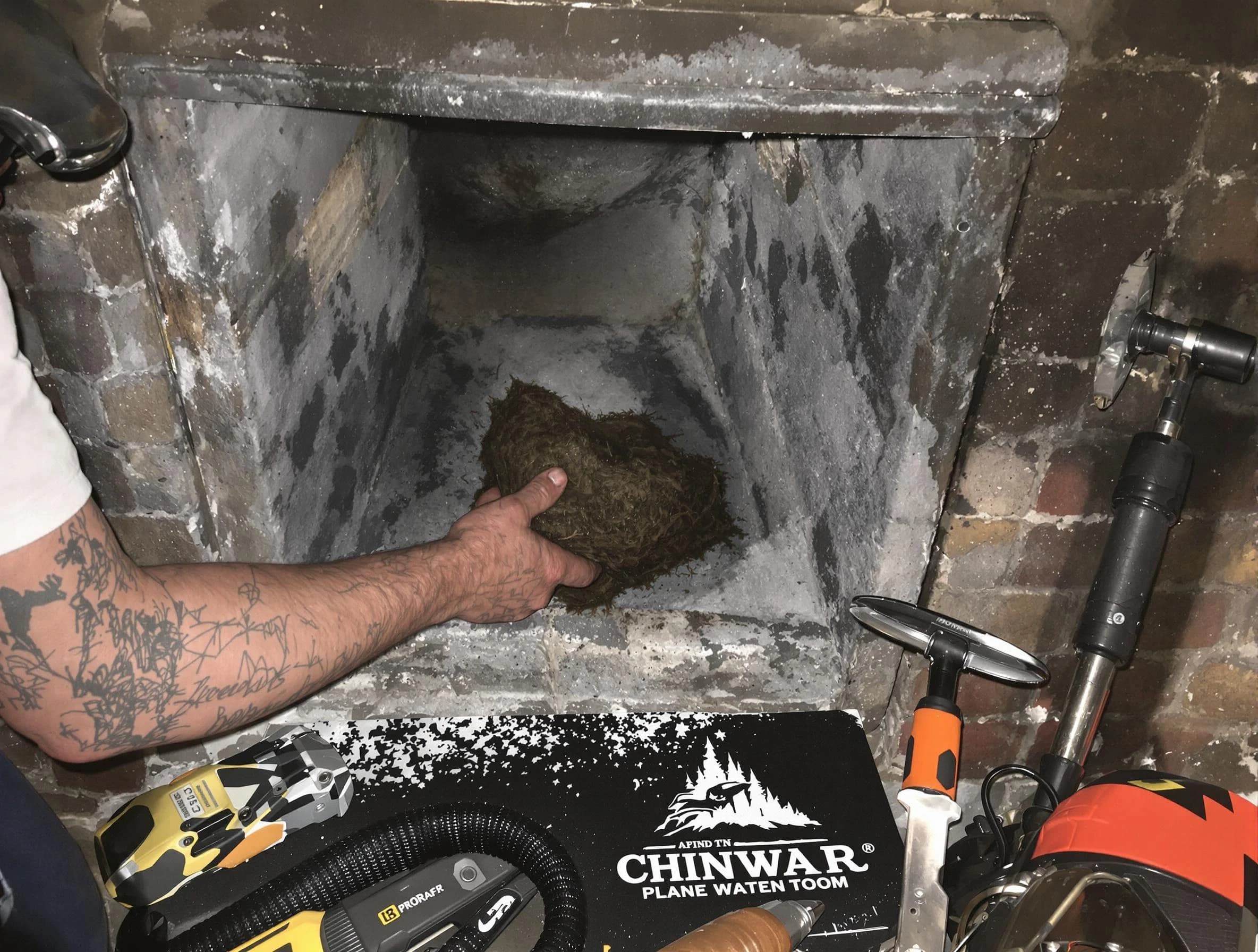 South Fayette Chimney Sweep safely removing debris and screening chimney in South Fayette, PA